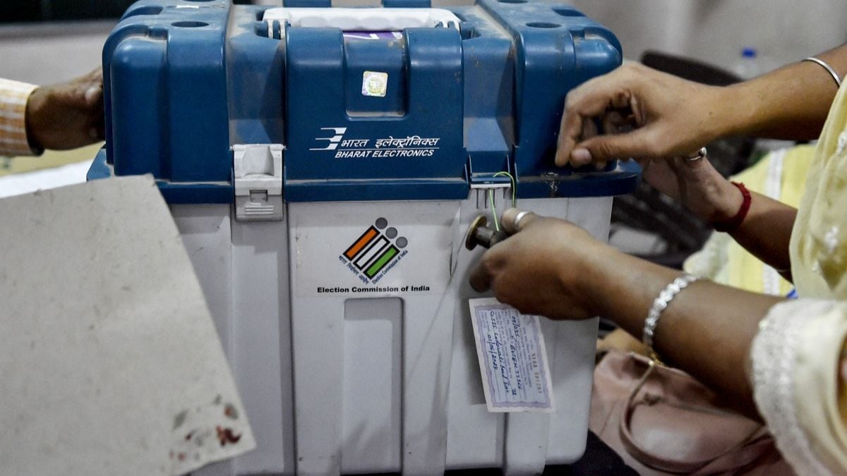 Polling officials seal Electronic Voting Machines (EVMs) and Voter Verifiable Paper Audit Trail (VVPAT) at the end of the seventh and final phase of voting in India’s general election at a polling station in Jalandhar.