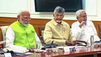 Prime Minister Narendra Modi with key allies TDP chief N Chandrababu Naidu and JD(U) chief Nitish Kumar during National Democratic Alliance (NDA) meeting at 7, Lok Kalyan Marg, in New Delhi on Wednesday. PTI